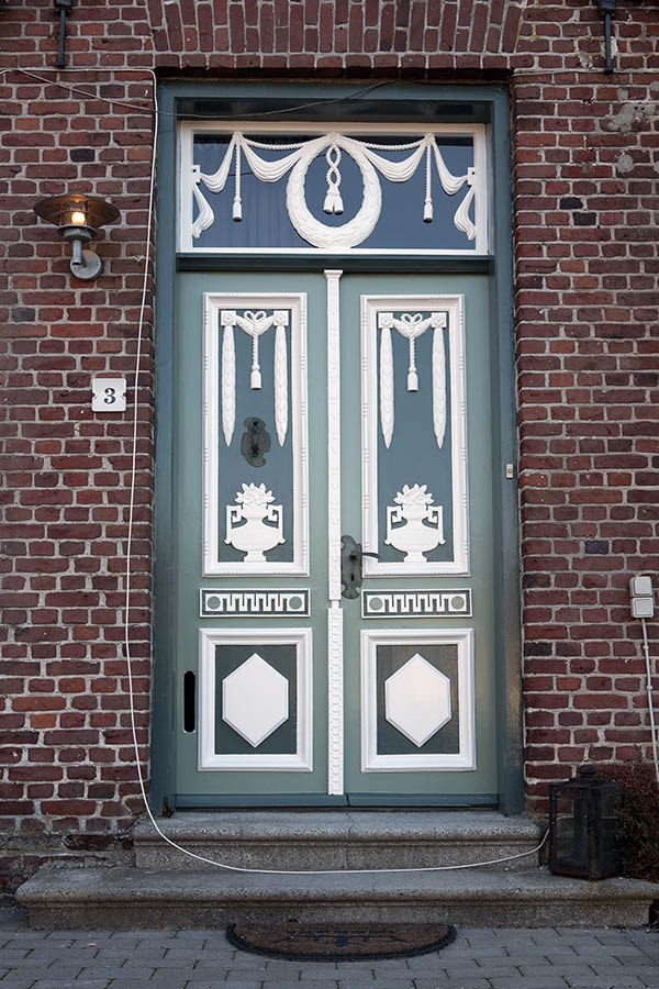 Photo 09612: Carved, panelled, teal, green and white double door