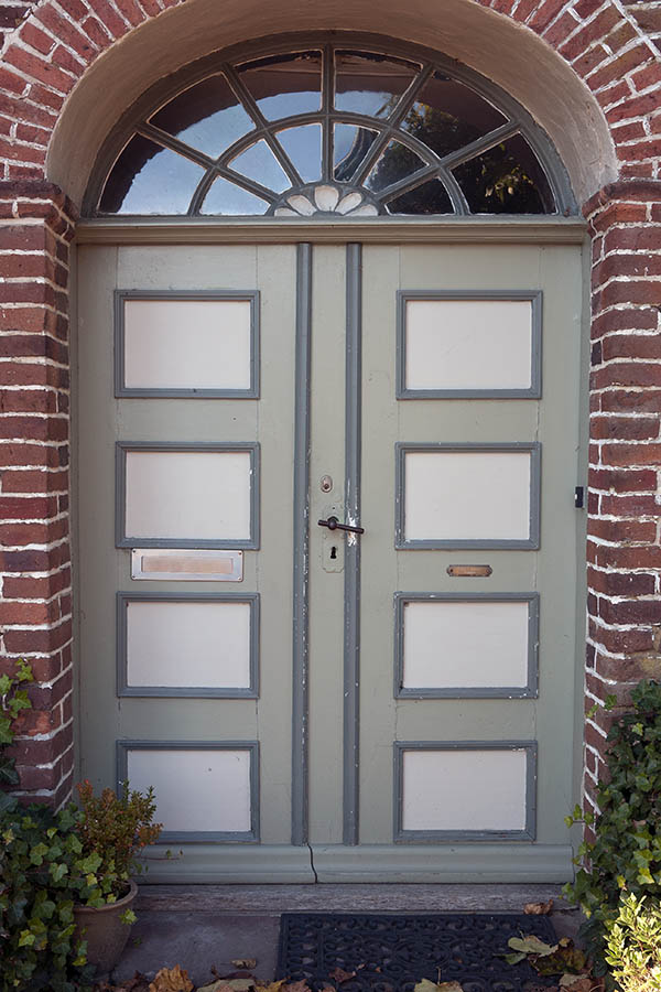 Photo 09624: Carved, panelled, grey, light grey and white double door with fan light