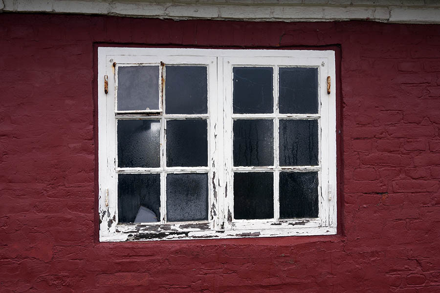 Photo 09652: Decayed, white window with two frames and 12 panes