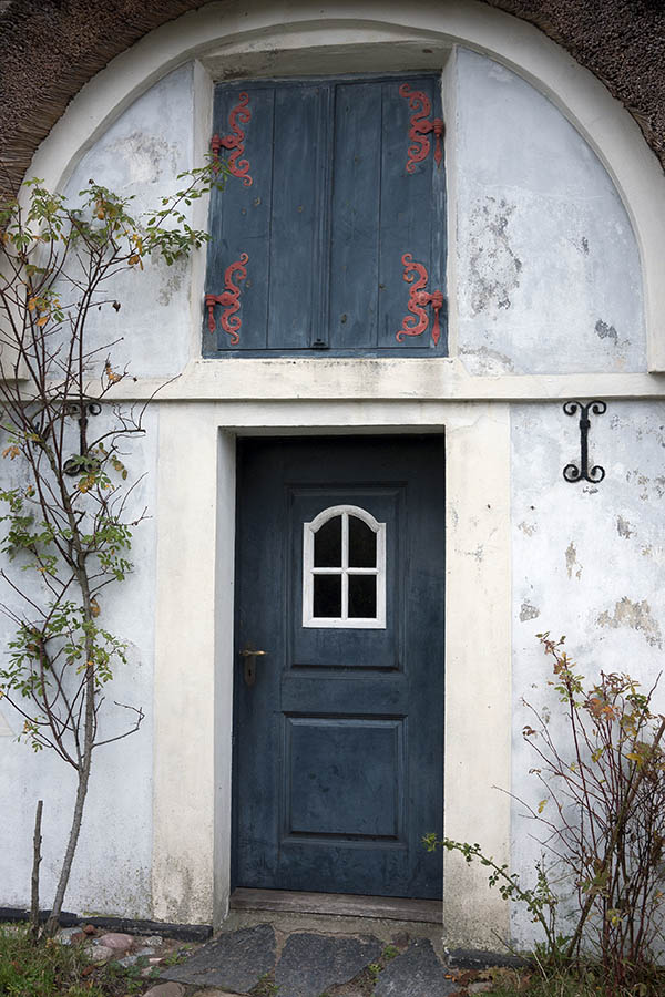Photo 09782: Panelled, blue and white door with formed door light