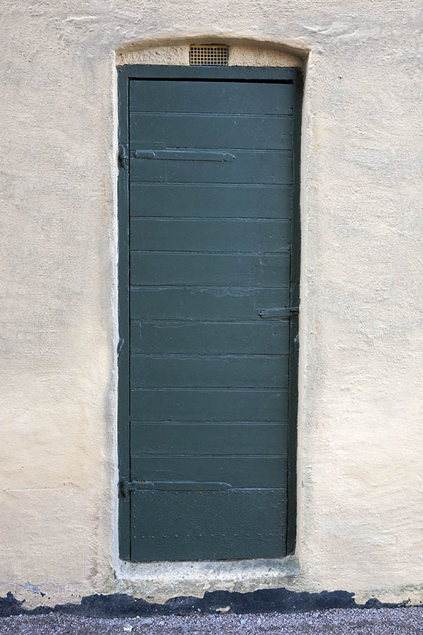 Photo 10031: Narrow, teal door made of planks