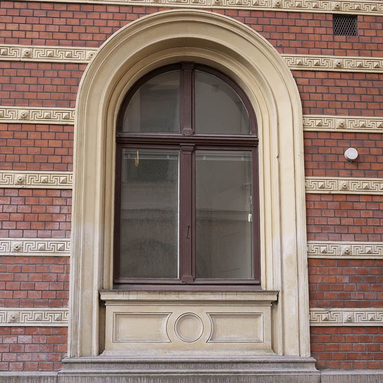 Photo 10072: Formed, dark brown window with four frames