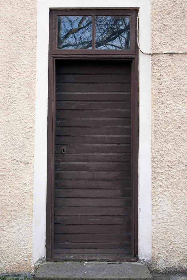 Photo 10204: Brown door made of planks with top window