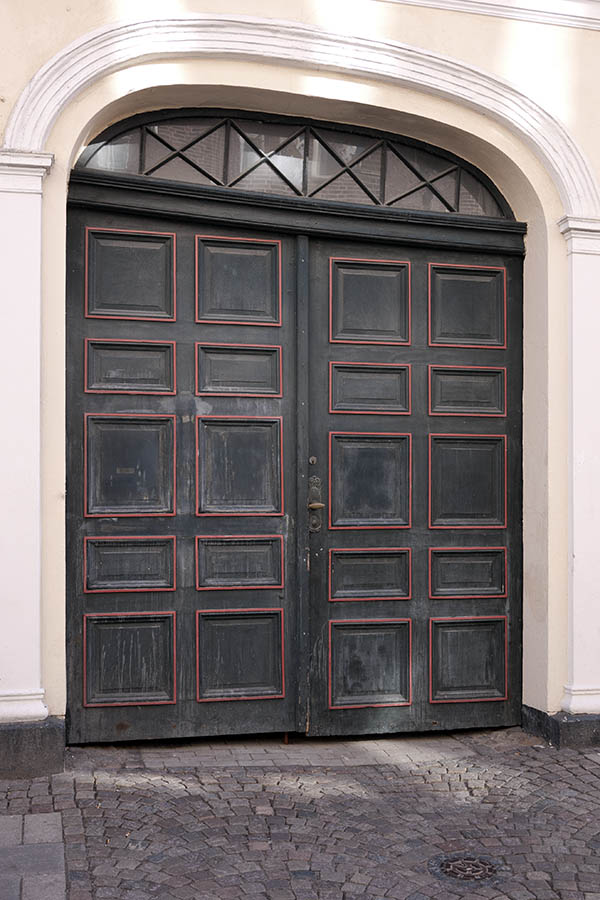 Photo 10341: Lopsided, formed, panelled, black and red gate with top window