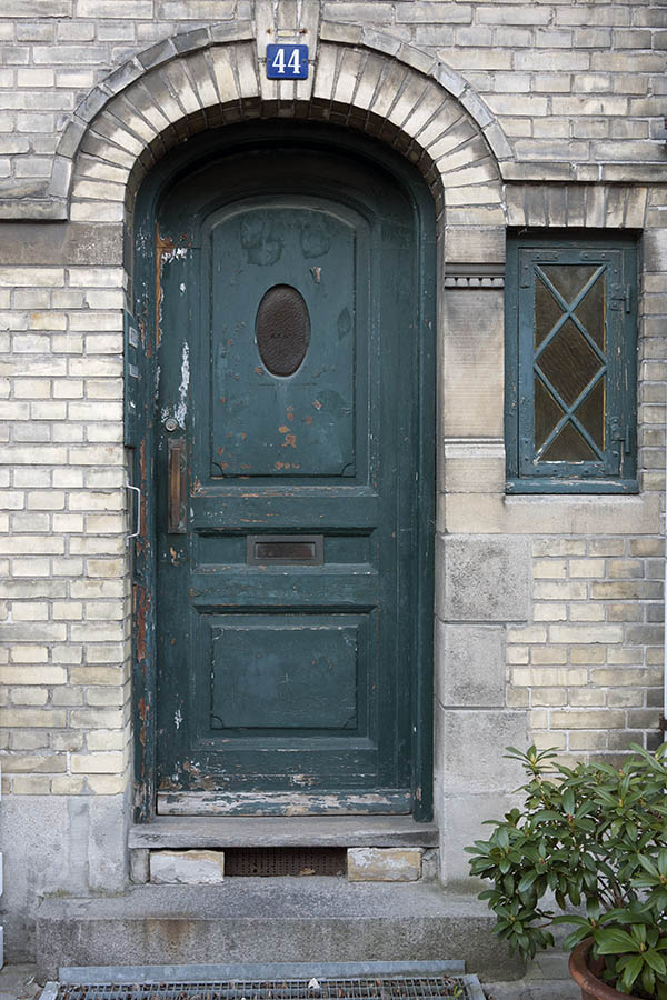 Photo 10504: Formed, panelled, teal door with formed door light
