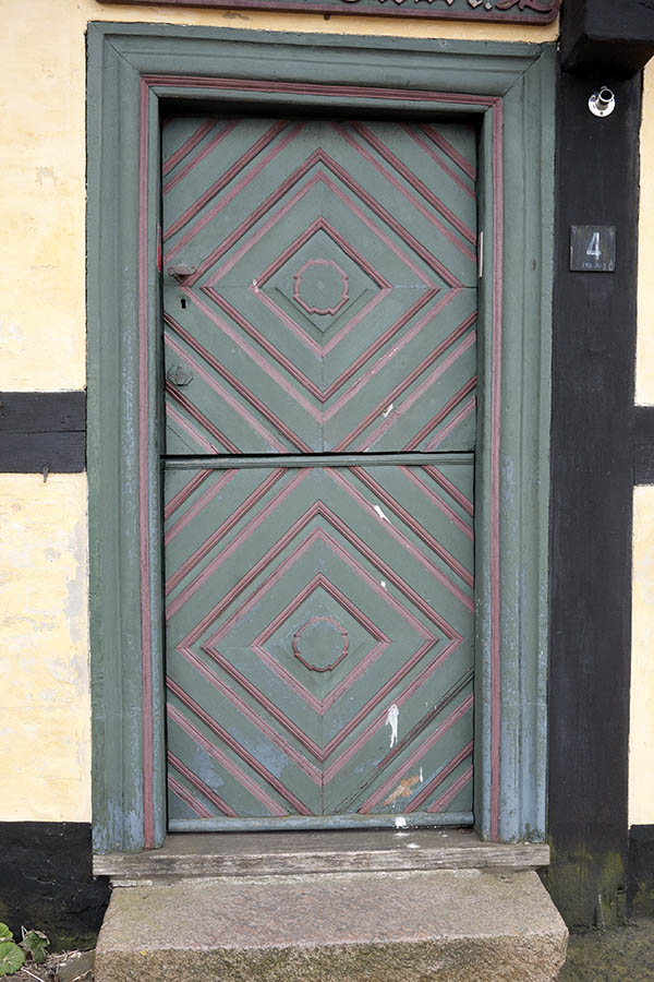 Photo 10554: Carved, green, blue and red half-door made of planks