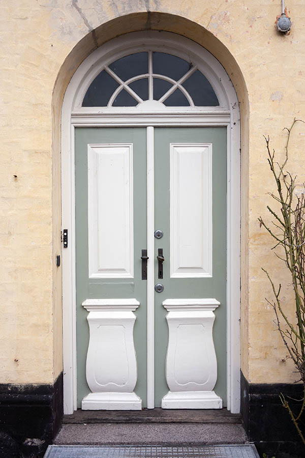 Photo 10578: Carved, panelled, grey and white double door with fan light