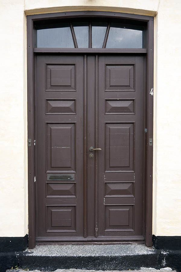 Photo 10584: Panelled, brown double door with fan light