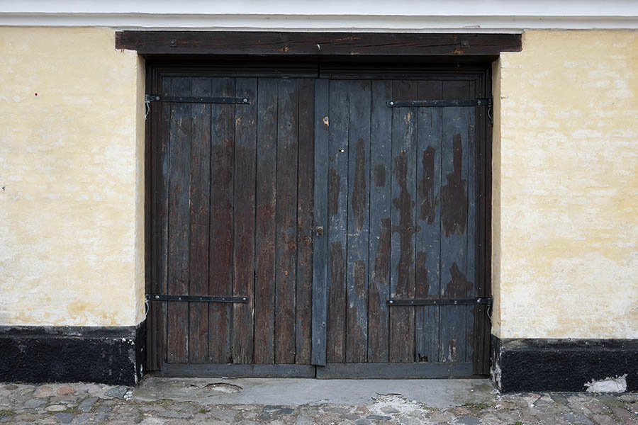 Photo 10615: Decayed, unpainted and blue gate made of planks