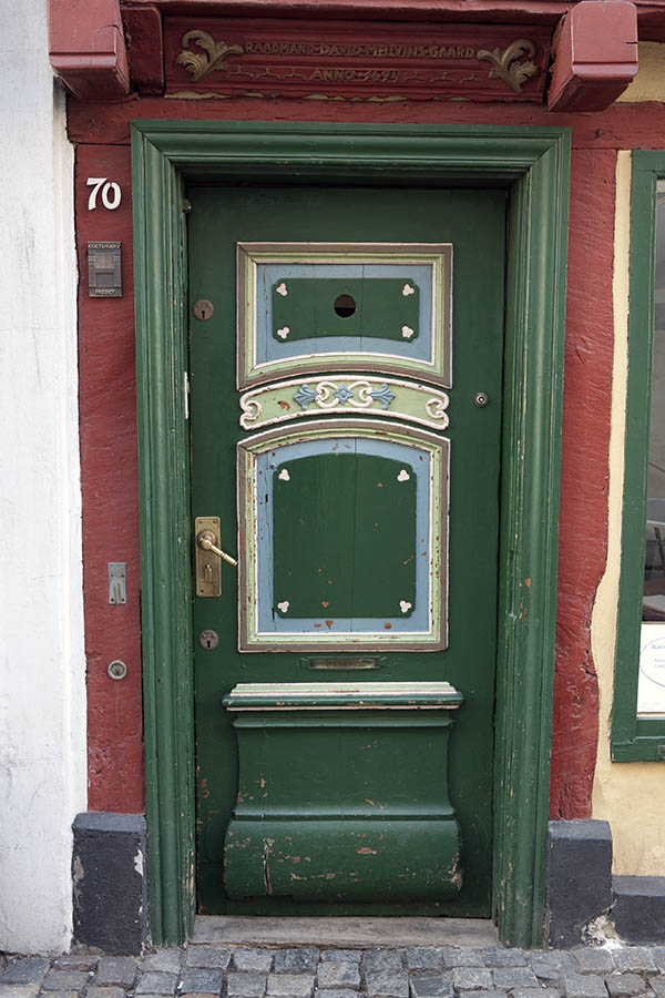 Photo 10813: Carved, panelled, green, blue, light green and white door