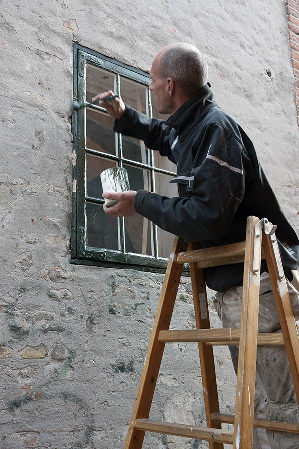 Photo 10868: Repair. Painting a green window.