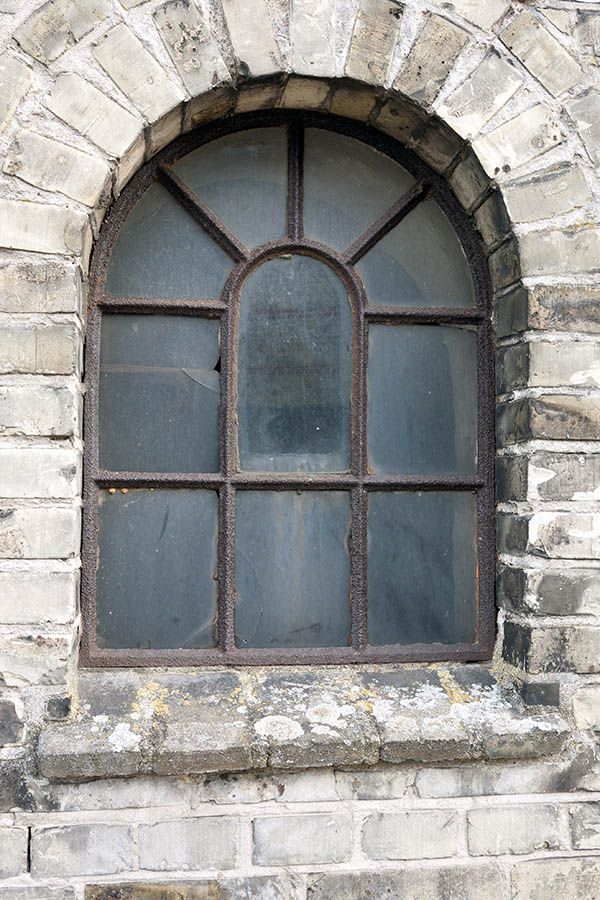 Photo 10946: Formed, brown, rusty, metal stable window