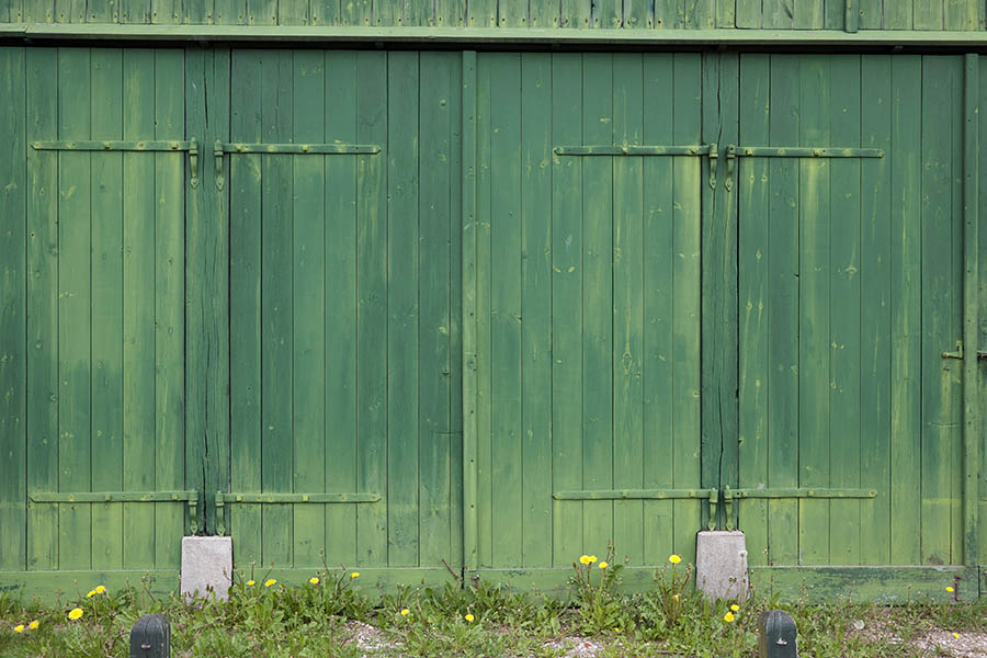 Photo 11133: Green garage doors made of planks