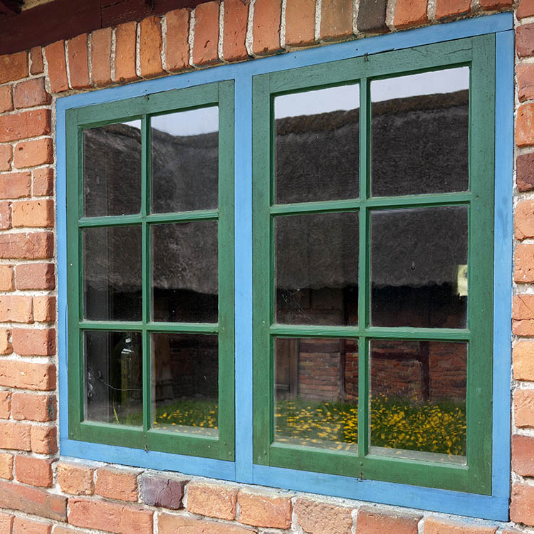 Photo 11191: Blue and green window with two frames and 12 panes