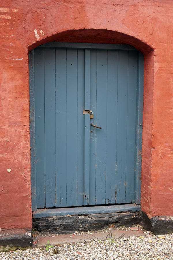 Photo 11390: Worn, teal double door made of planks