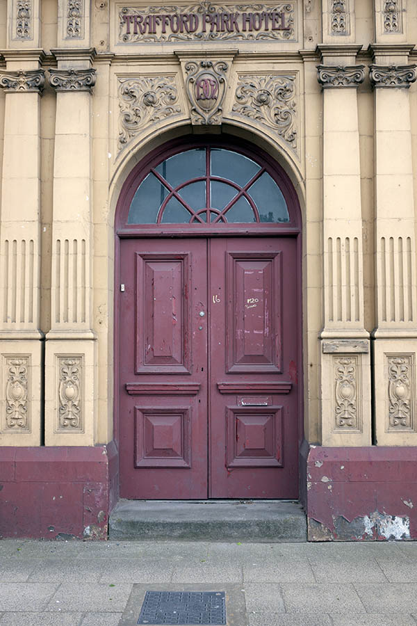 Photo 11480: Panelled, purple double door with fan light