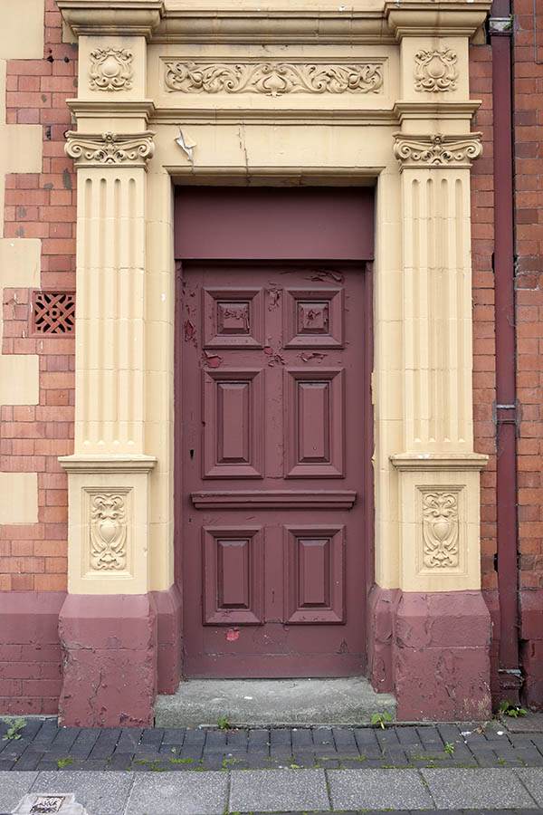 Photo 11484: Panelled, brown door