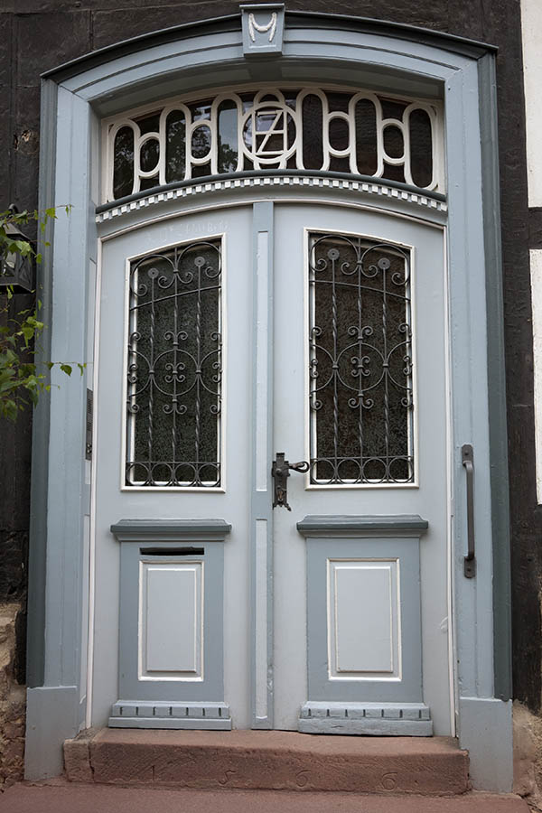 Photo 11847: Formed, panelled, light blue, grey and white double door with top window and door lights