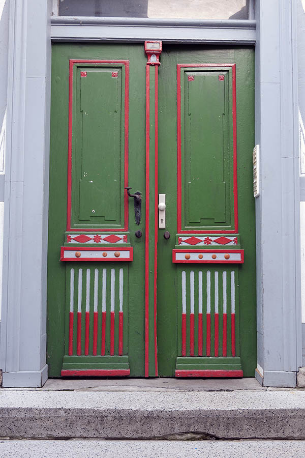 Photo 11877: Panelled, carved, green, red and light grey double door with top window