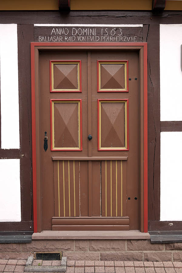 Photo 12118: Wide, panelled, brown, red and yellow door