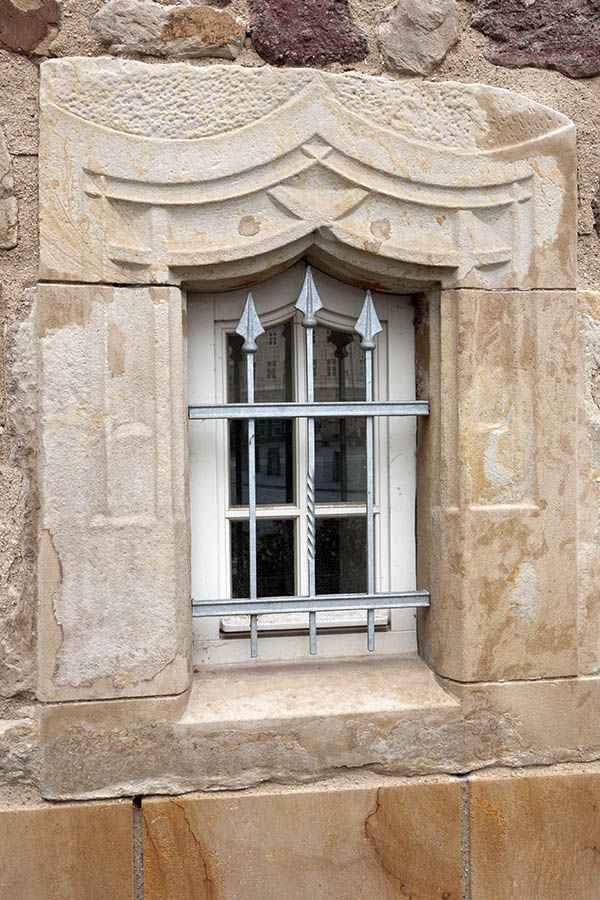 Photo 12170: Little, formed, white window with grating