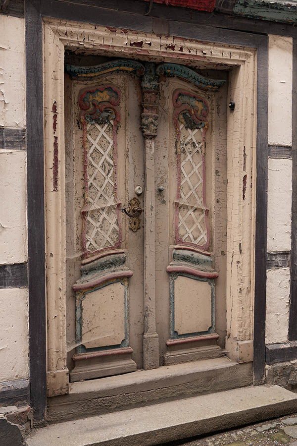 Photo 12205: Decayed, carved, pink, green, blue, yellow and red double door in baroque style