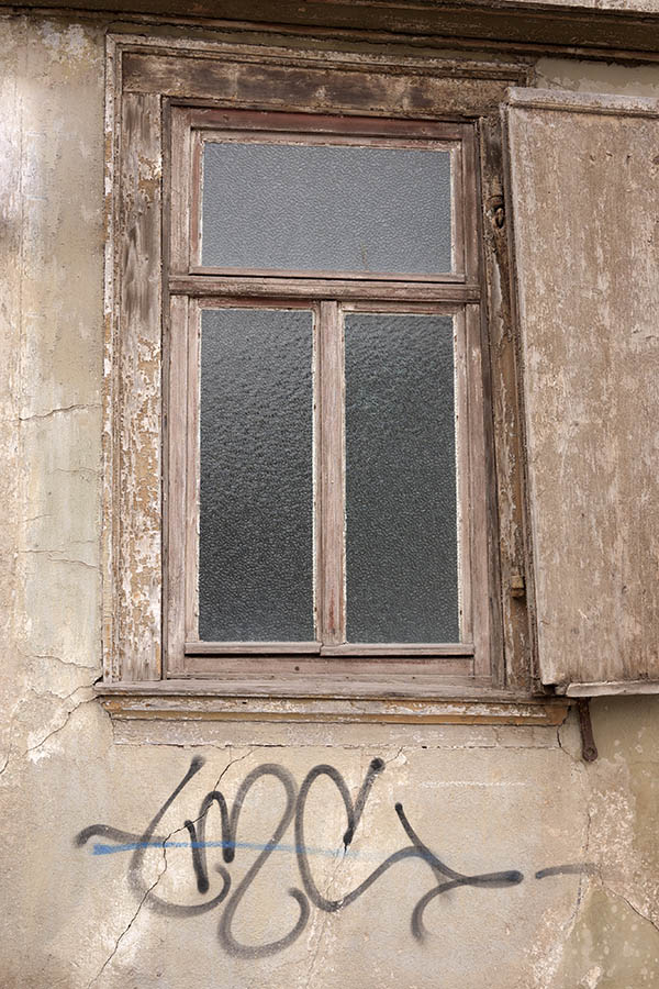 Photo 12229: Decayed unpainted window with three frames