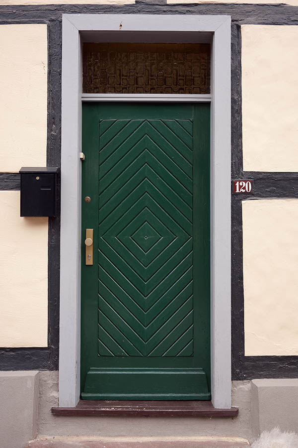 Photo 12259: Panelled, green door of board with top window