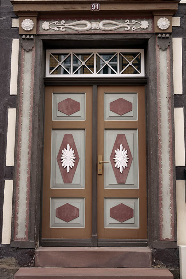 Photo 12271: Panelled, brown, red, grey and white double door with top window