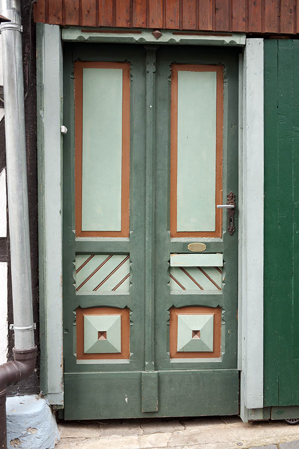 Photo 12325: Carved, panelled, green, light green and brown door