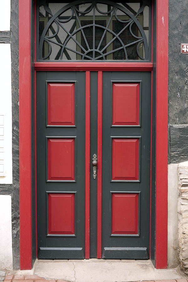 Photo 12344: Panelled, black and red double door with top window