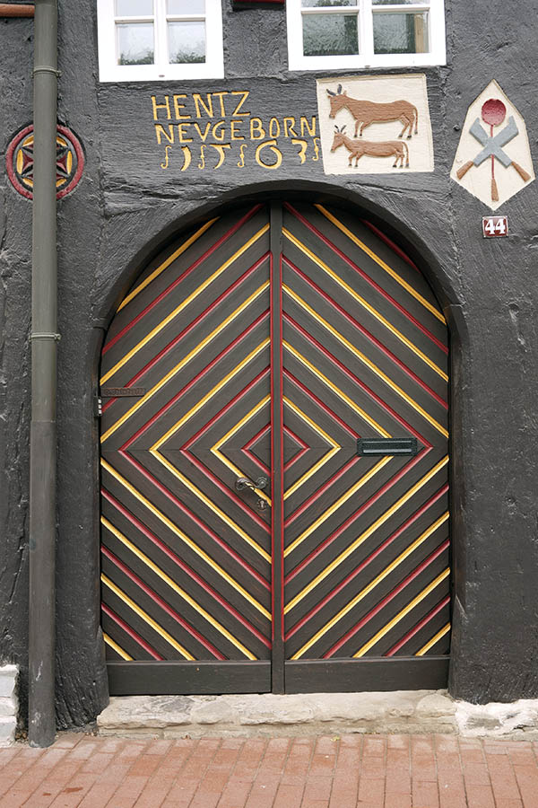 Photo 12432: Lopsided, brown, yellow and red gate