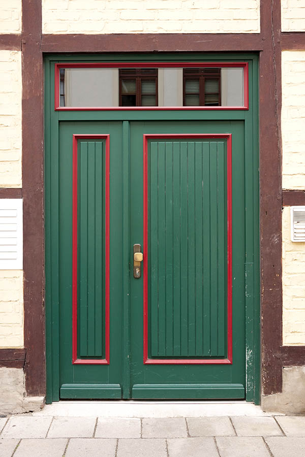 Photo 12575: Panelled, green and red door with sidepiece and top window