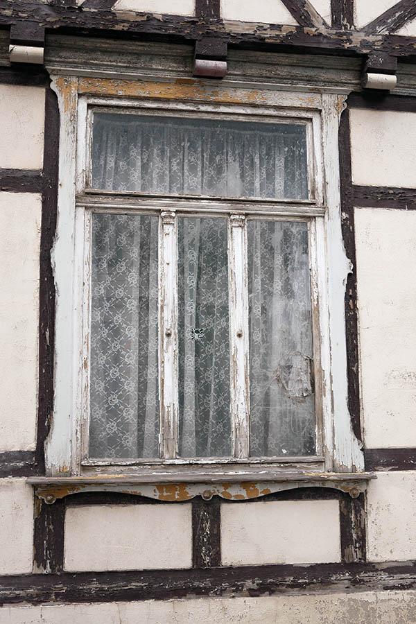 Photo 12579: Decayed, white window with four frames