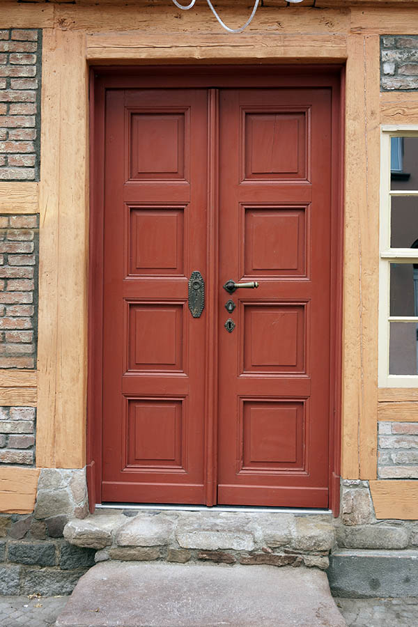Photo 12615: Panelled, red double door