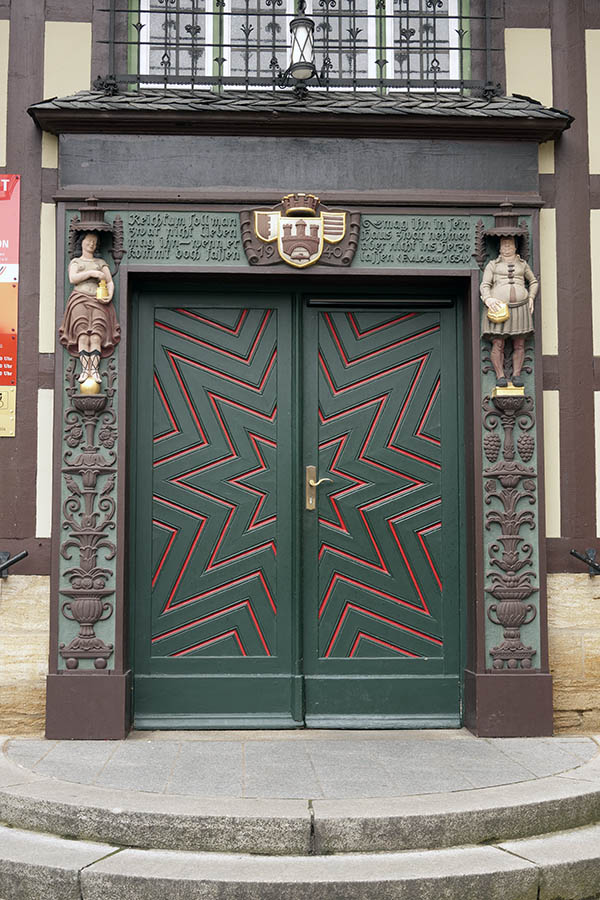 Photo 12692: Carved, panelled, green and red double door