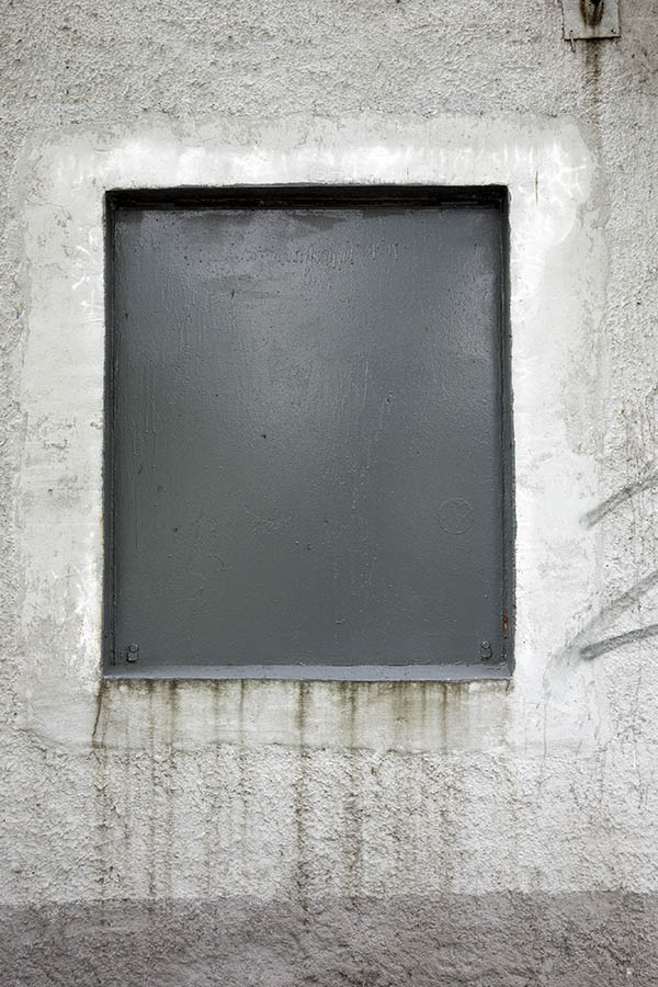 Photo 12772: No window. Grey embrasure in a white, roughcast wall.