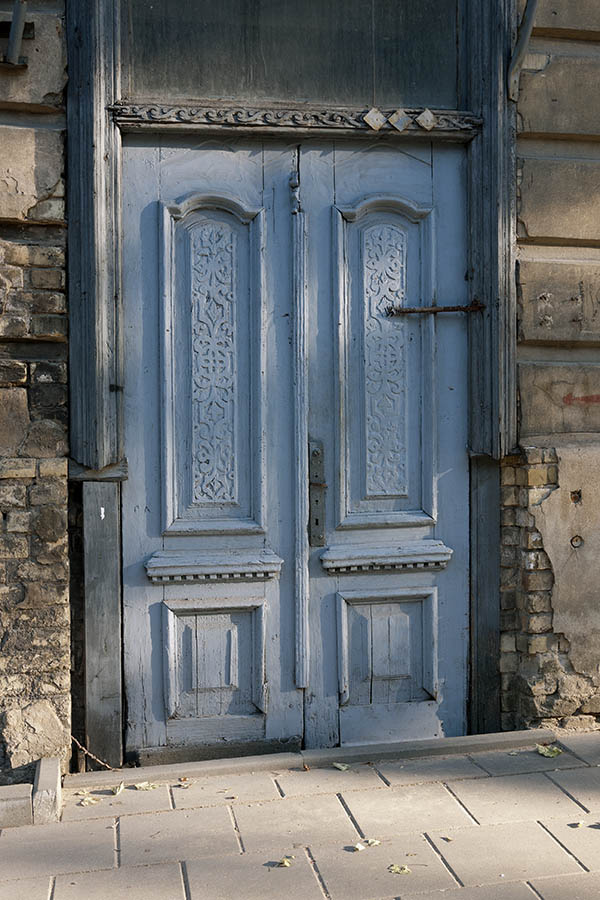 Photo 12998: Decayed, carved, panelled, teal double door with top window