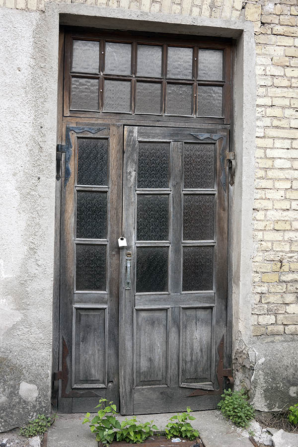 Photo 13317: Worn, unpainted door with sidepiece, top window and door lights