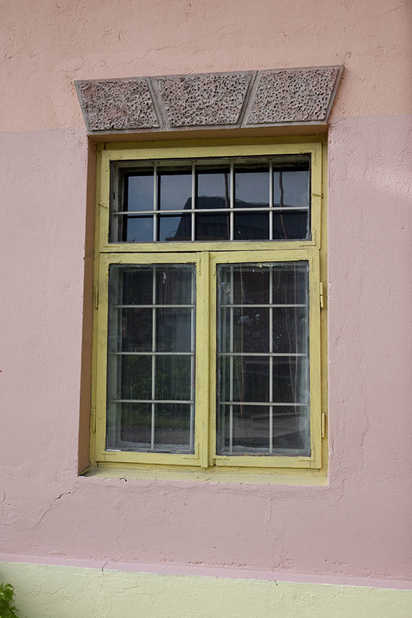 Photo 13336: Yellow, barred window with three frames