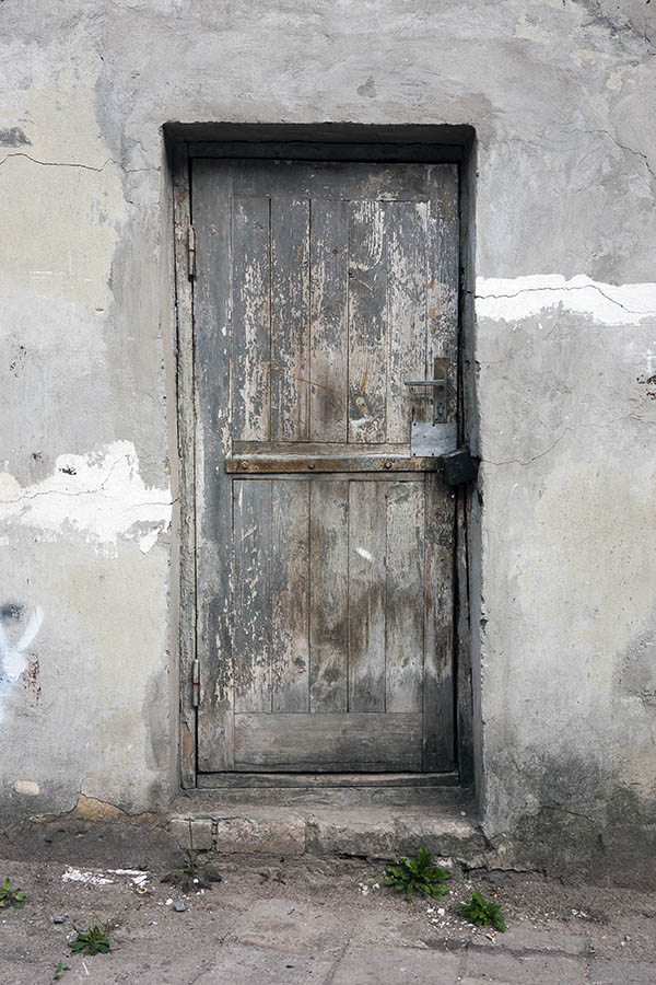 Photo 13396: Decayed, panelled, grey door