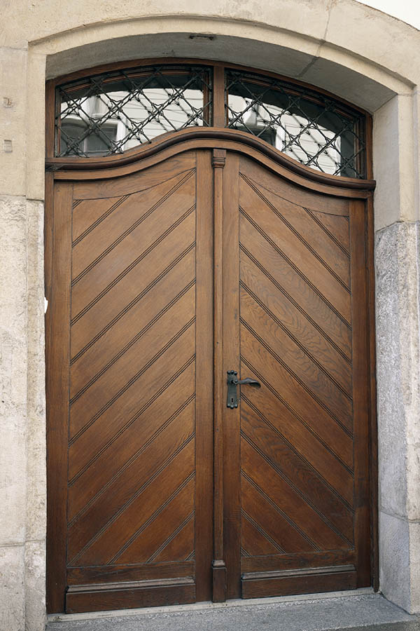 Photo 13462: Panelled, formed, oiled double door with latticed fan light