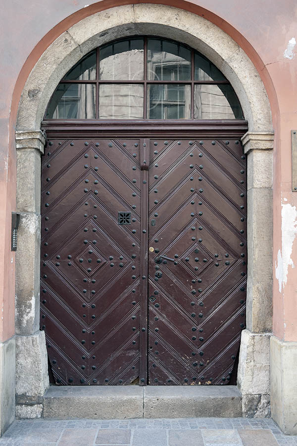 Photo 13501: Brown double door made of planks with fan light
