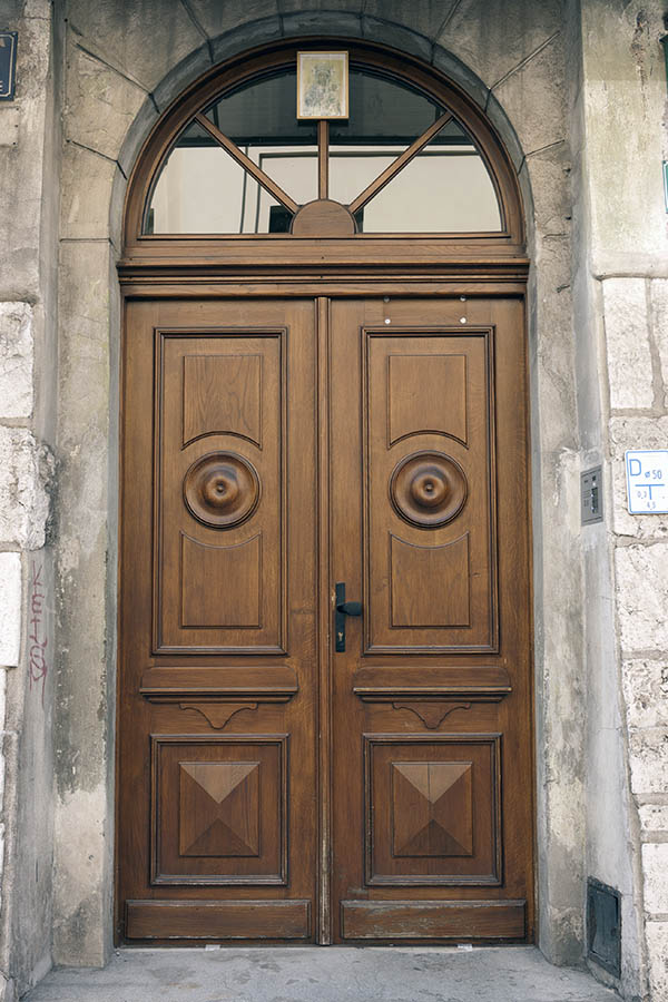 Photo 13512: Carved, panelled, lacquered double door with fan light