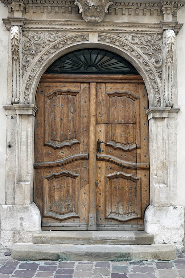 Photo 13624: Formed, carved, oiled gate with minor door and latticed fan light