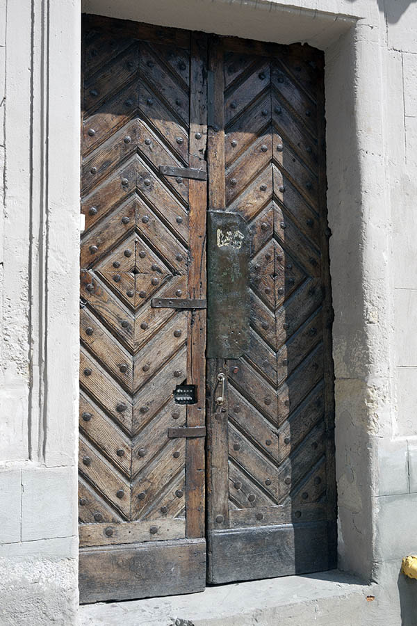 Photo 13823: Worn, panelled, brown, lacquered double door
