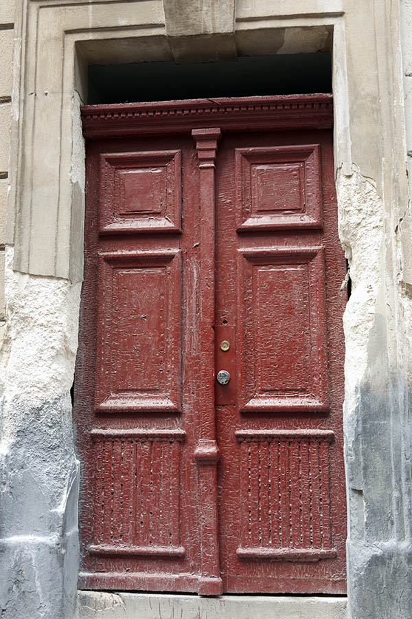 Photo 13931: Worn, panelled, red double door with top window