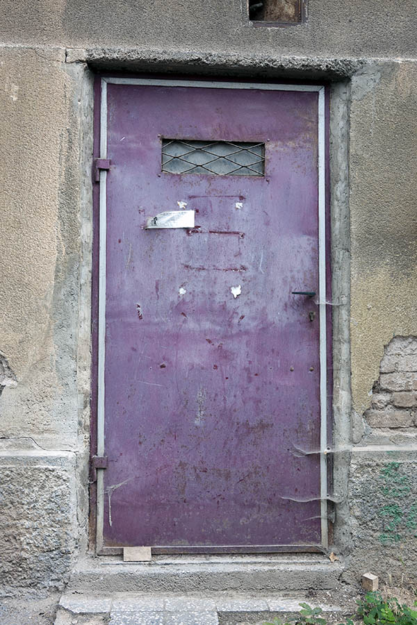 Photo 14624: Purple metal plate door with latticed door light