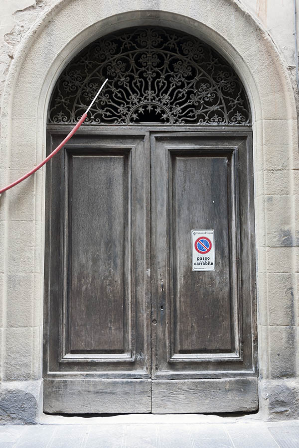 Photo 14680: Worn, panelled, grey and unpainted gate with latticed cast iron fan light