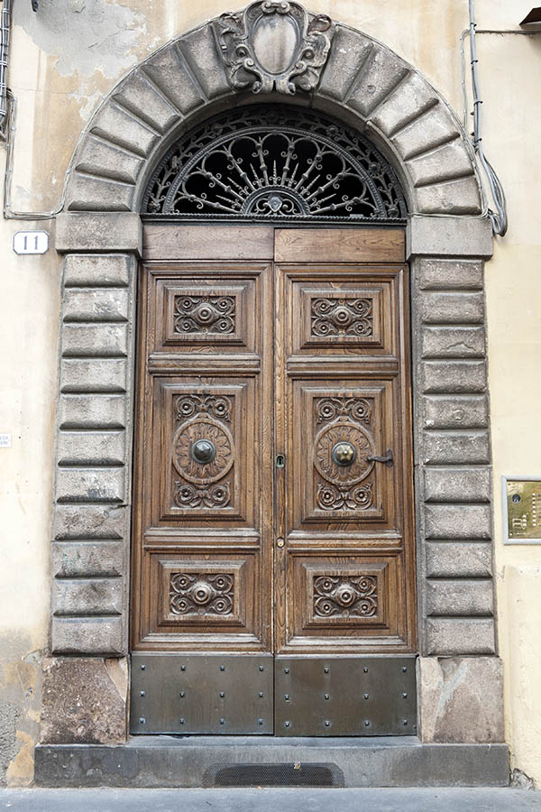 Photo 14969: Carved, panelled, oiled double door with latticed fan light